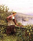 Daniel Ridgway Knight Famous Paintings - Brittany Girl Overlooking Stream